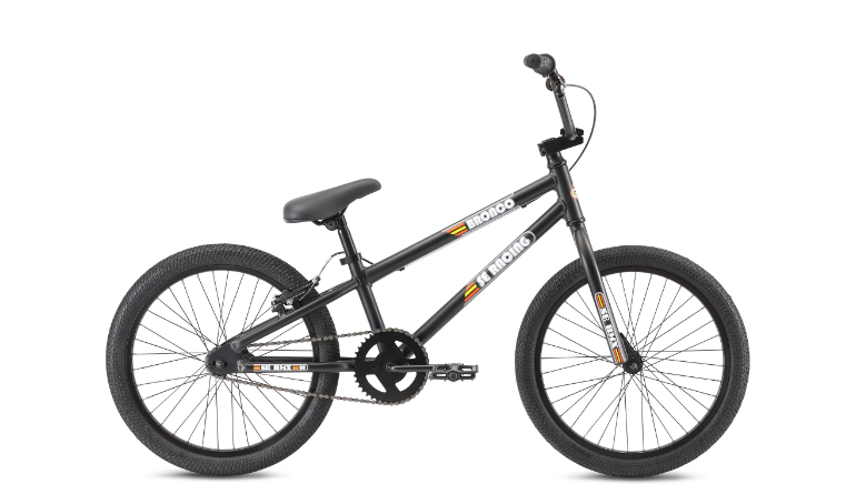 A black bmx bike is shown on a white background.