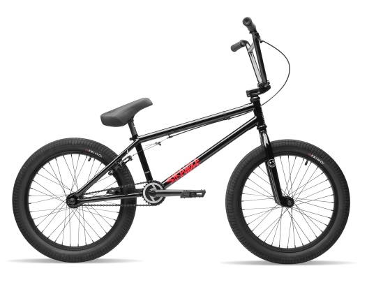 A black bmx bike is sitting on a white background.