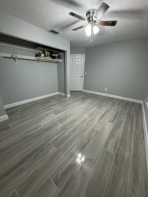 There is a ceiling fan in the room.