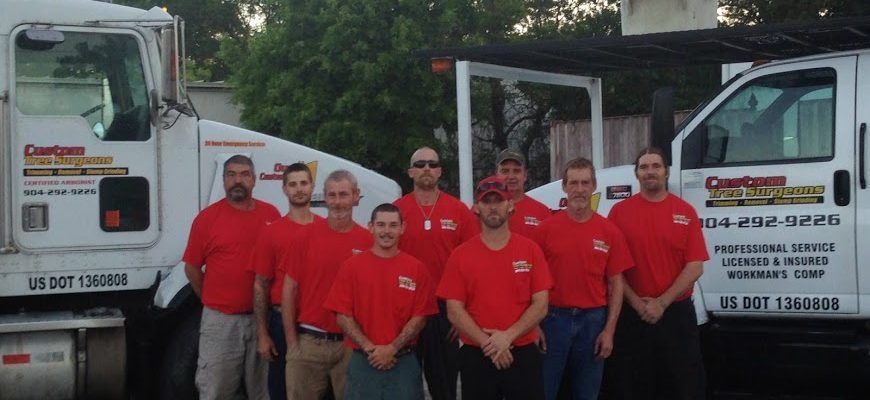 Men in Red Uniform — Jacksonville, FL — Custom Tree Surgeons Men in Red Uniform — Jacksonville, FL — Custom Tree Surgeons