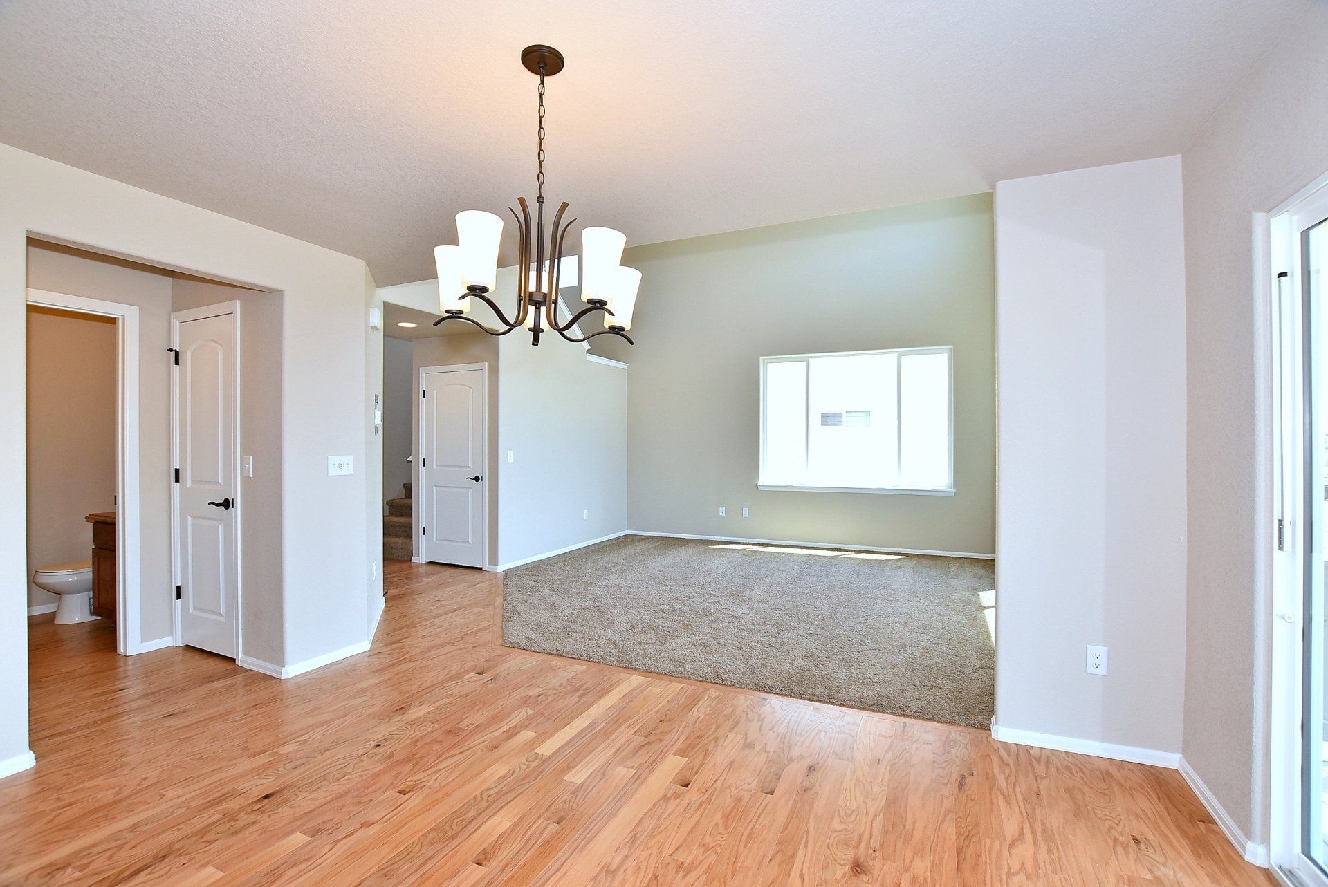Large room with wooden floors