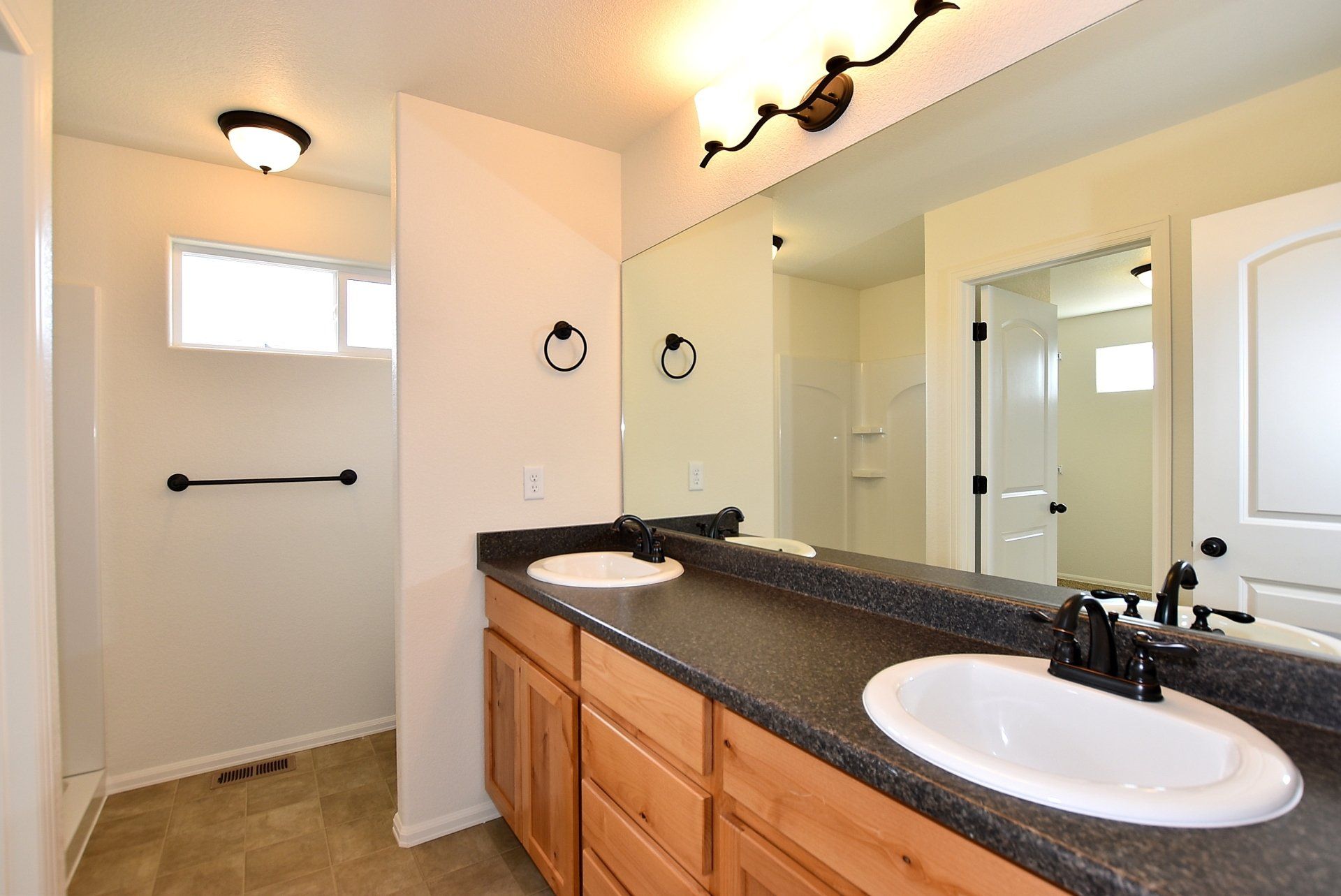 Bathroom with countertops and sinks