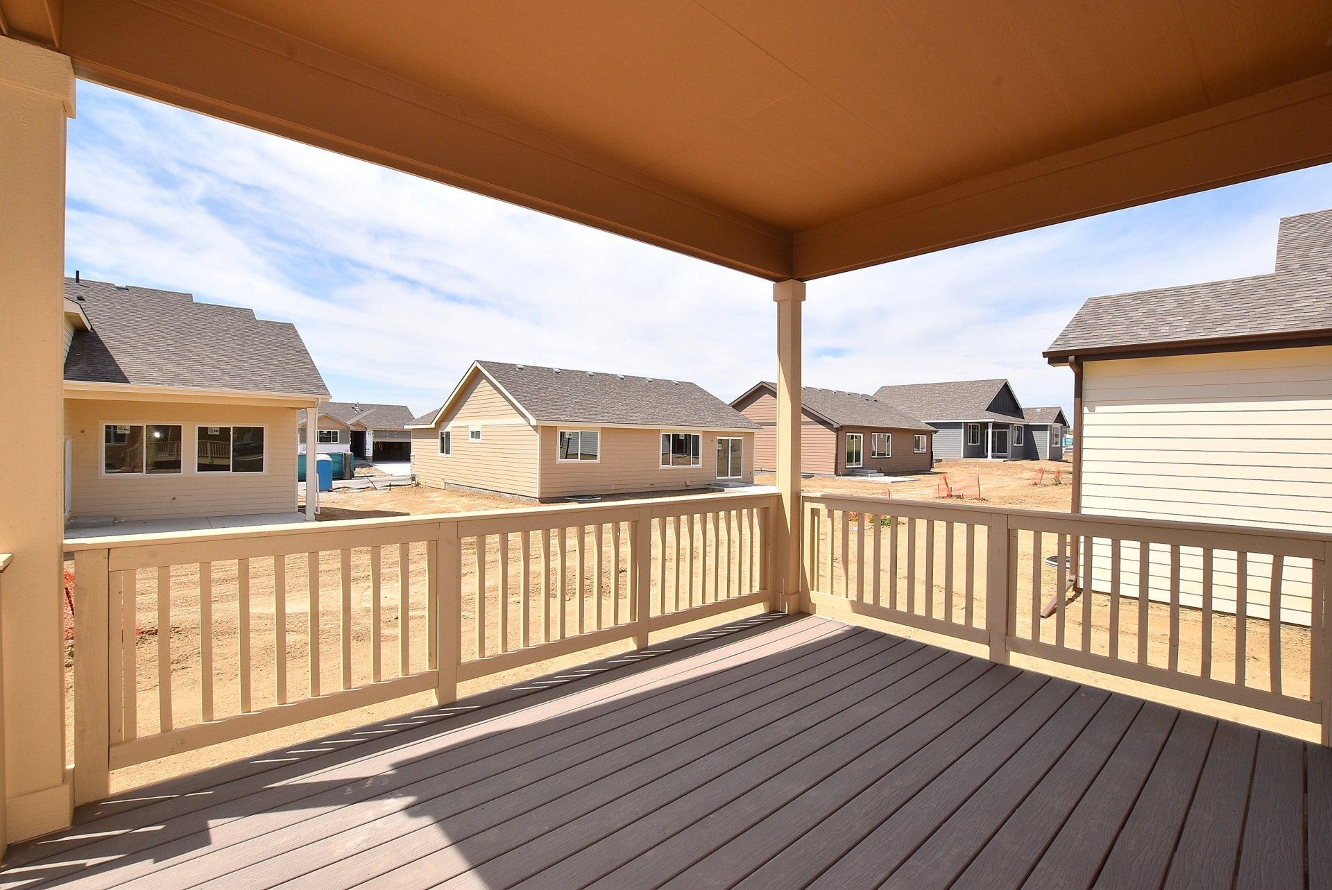 Patio with view of new homes