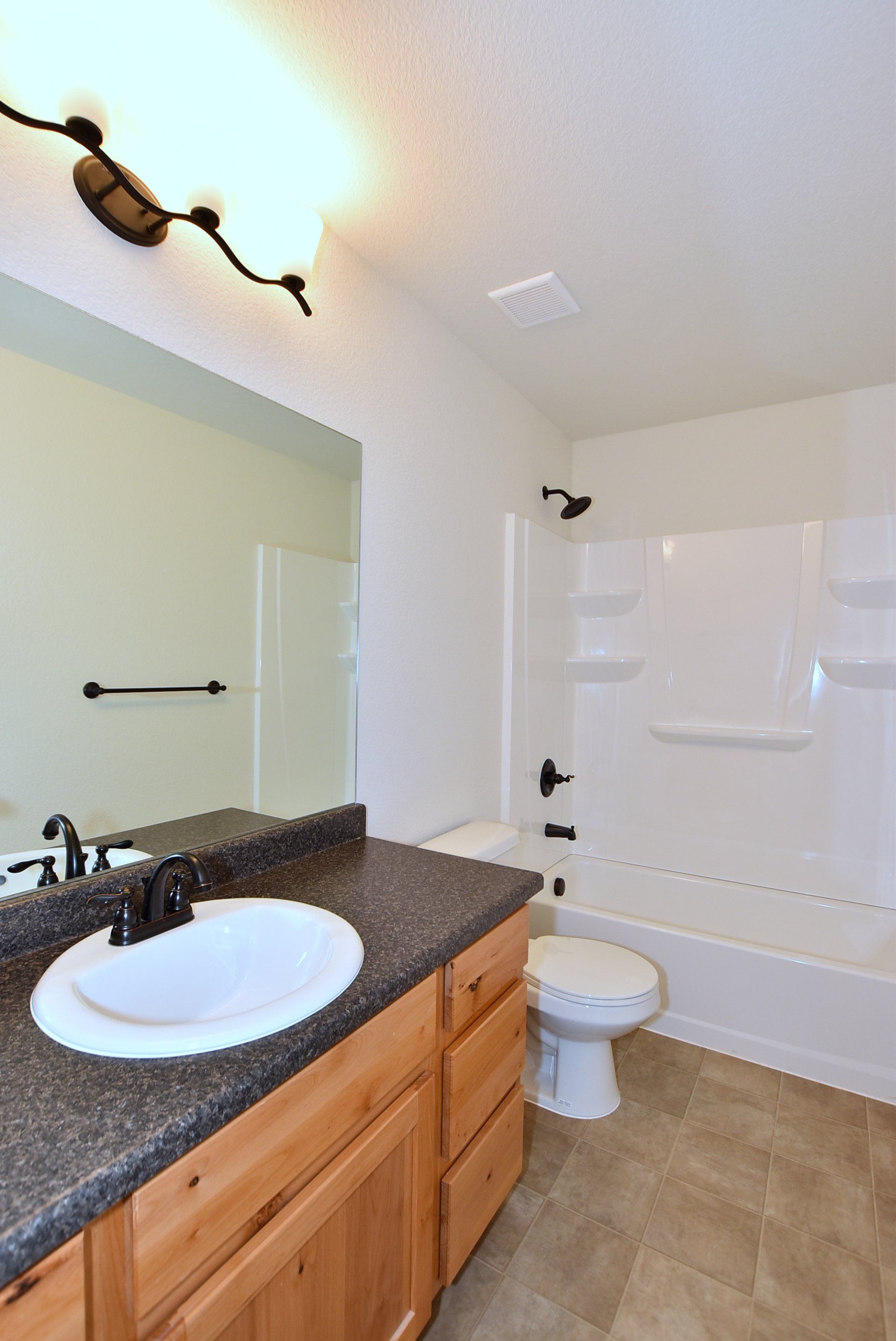 Bathroom with sink and shower