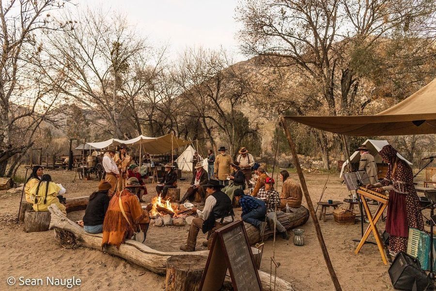 People reenacting an old west town