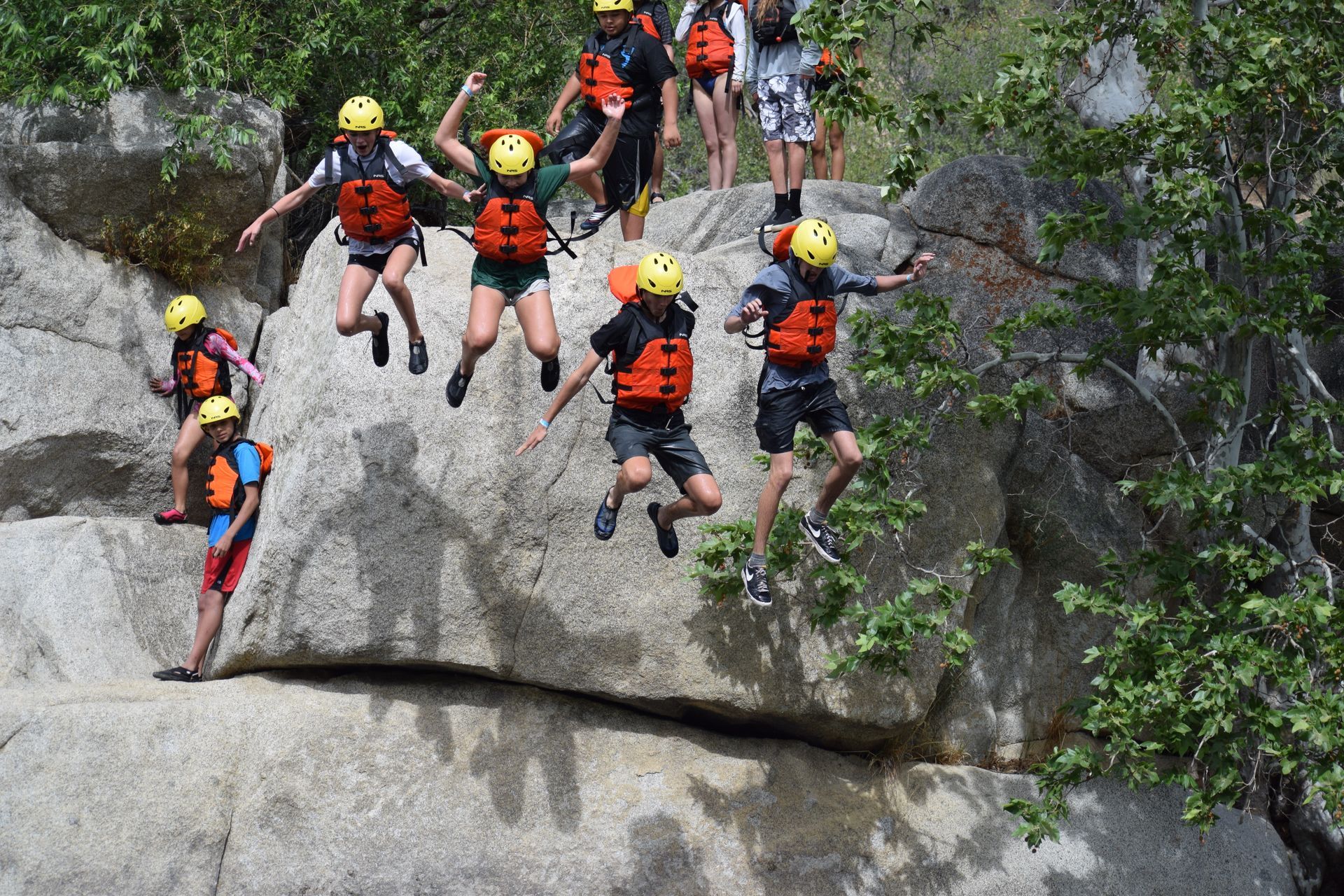 A group of people are rafting down a river.