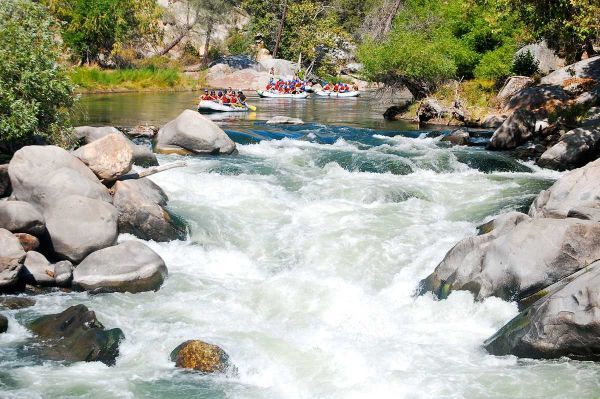 3 boats at the top of rapids