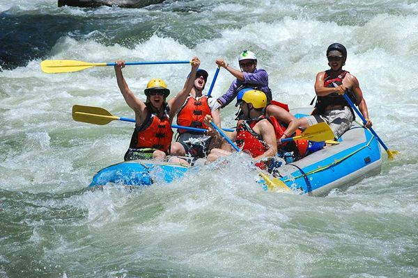 people happy going down rapids