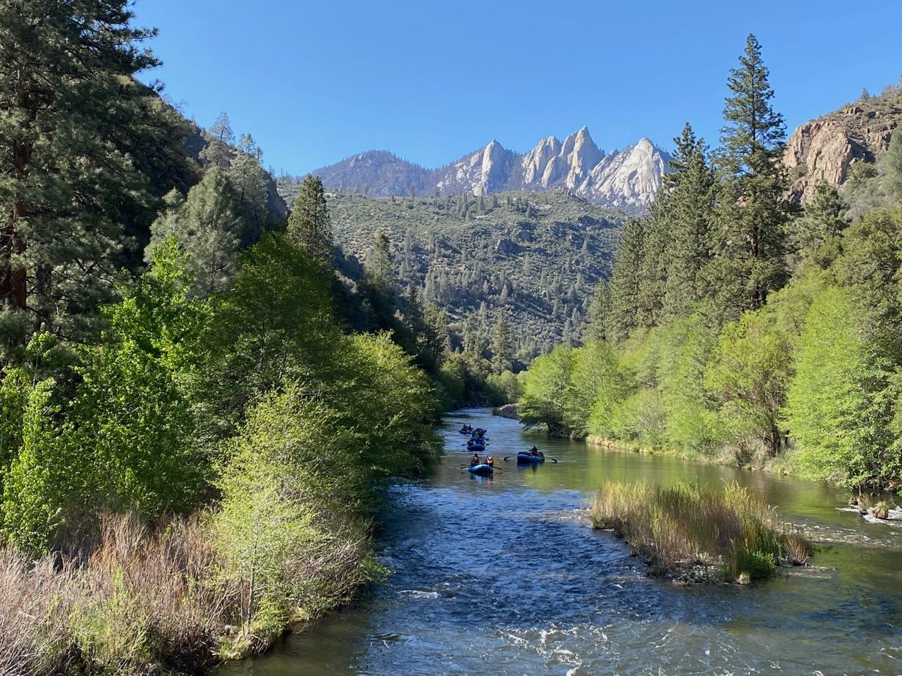 rafting through the kern and mountains in the background