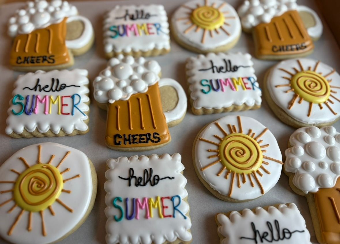 Summer-themed sugar cookies: beer mugs, suns, and 