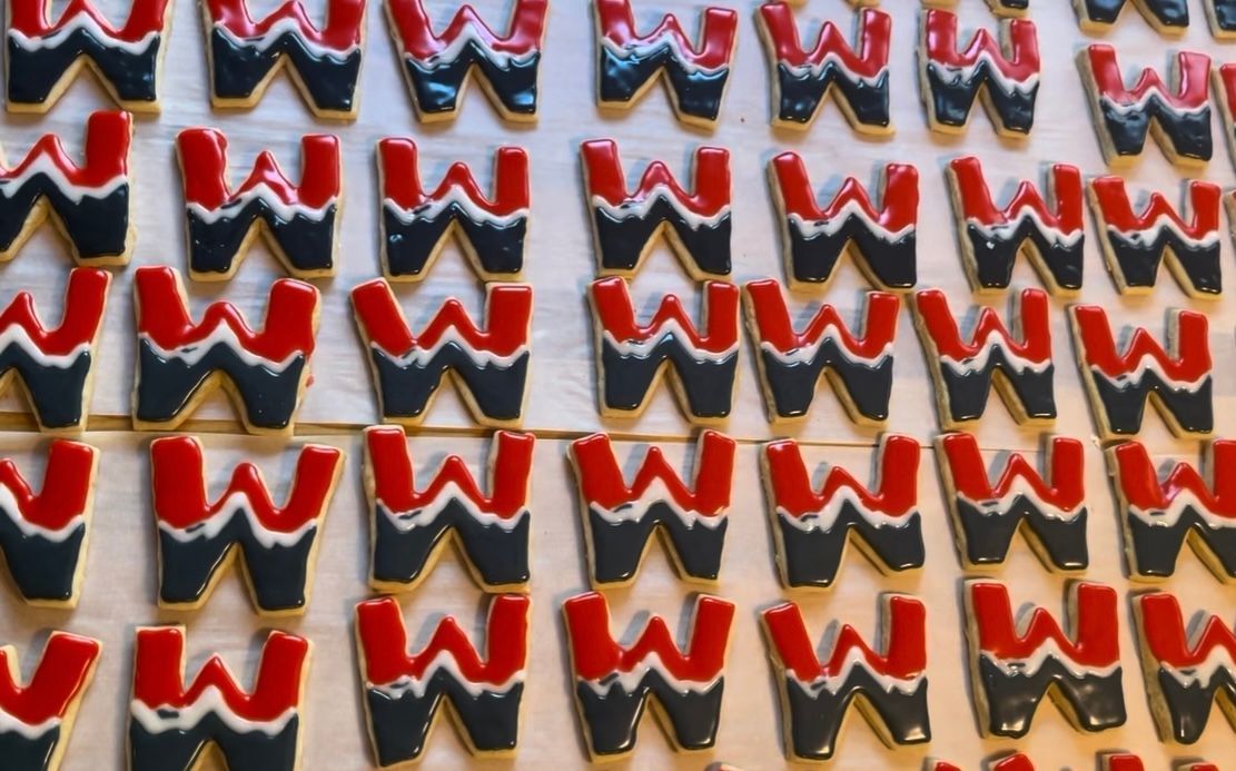 Rows of red, black, and white glazed 