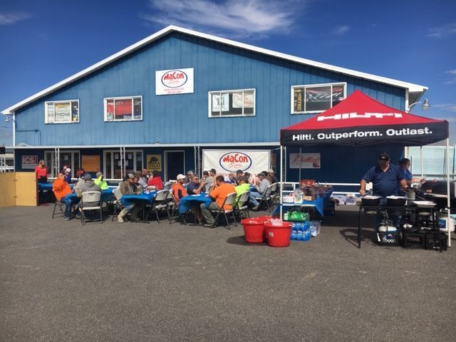 Outdoor customer appreciation event at Macon facility featuring Hilti Tools tent, food service, and construction professionals. Outdoor customer appreciation event at Macon facility featuring Hilti Tools tent, food service, and construction professionals.