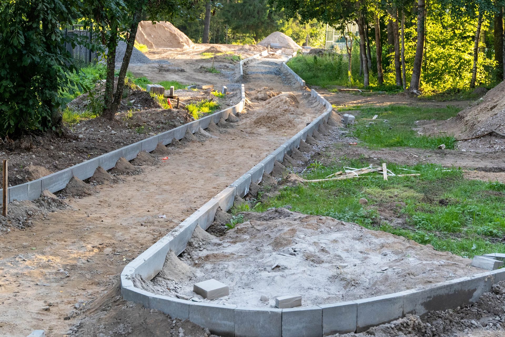 A Winding Pathway Is Being Constructed With Concrete Curbing | Bozeman, MT - MaCon Supply