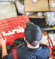 Worker using Hilti tools Worker using Hilti tools
