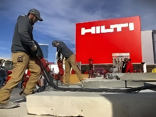Workers on site, showcasing safety and precision while using hilti tools for construction tasks.