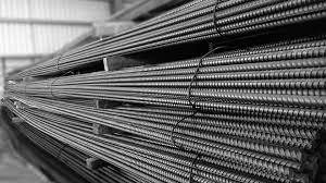 A close up of a bunch of steel bars stacked on top of each other.
