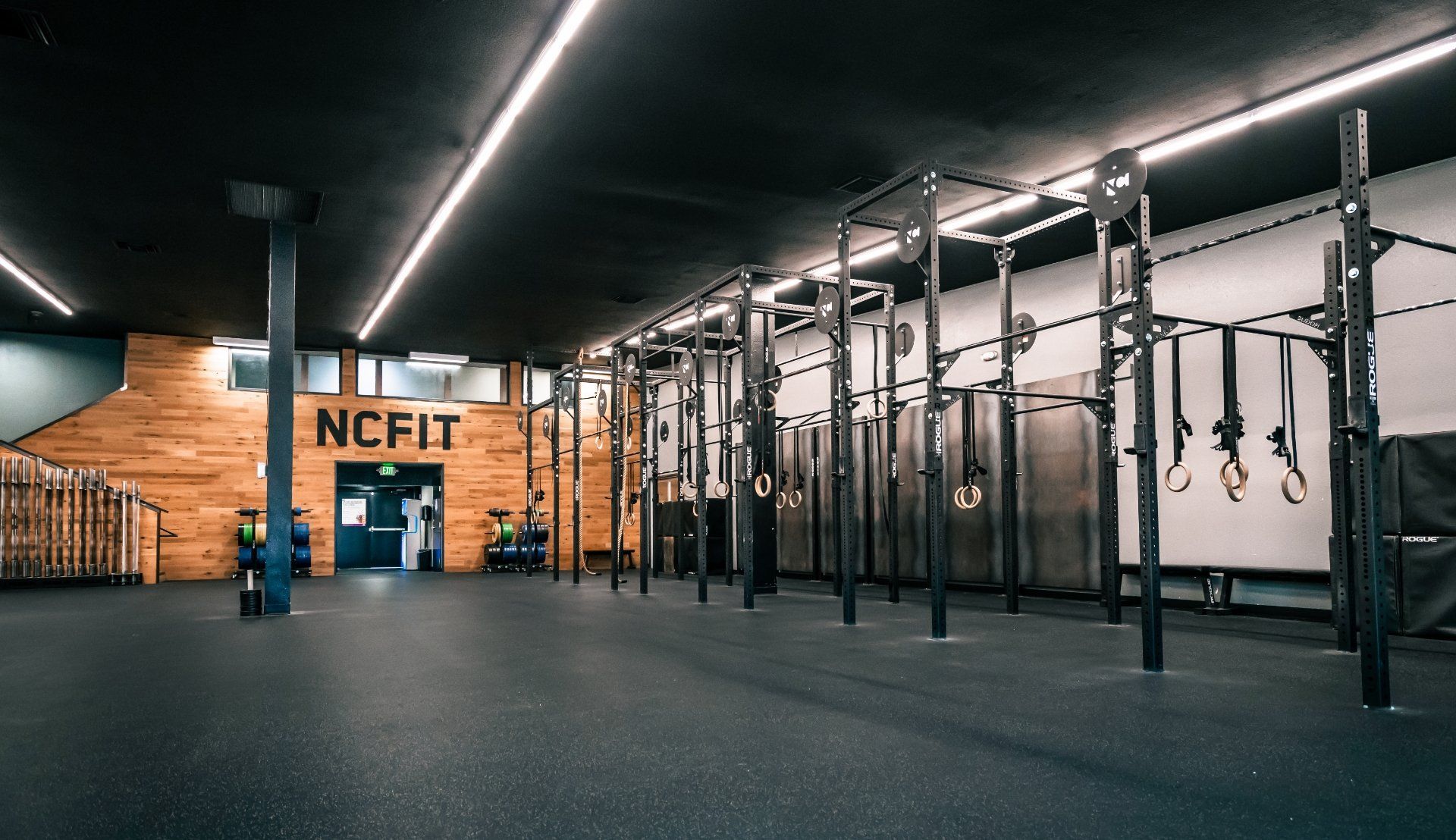 A gym with a sign that says ncfit on it
