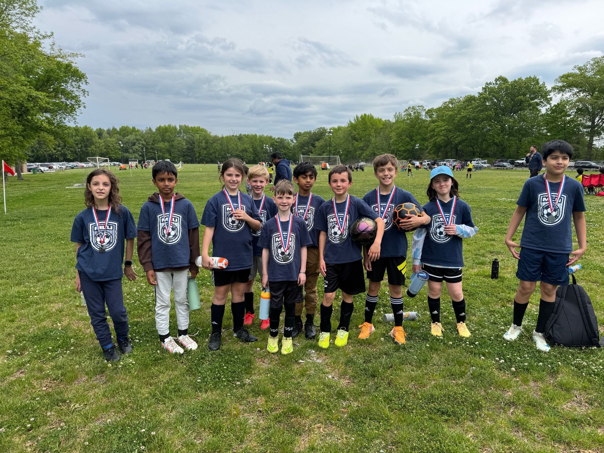 Mount Laurel United Soccer rec team with medals