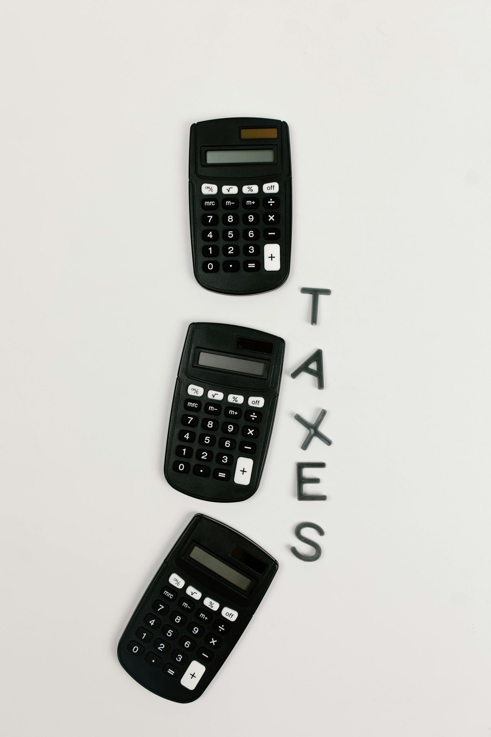Three calculators with the word