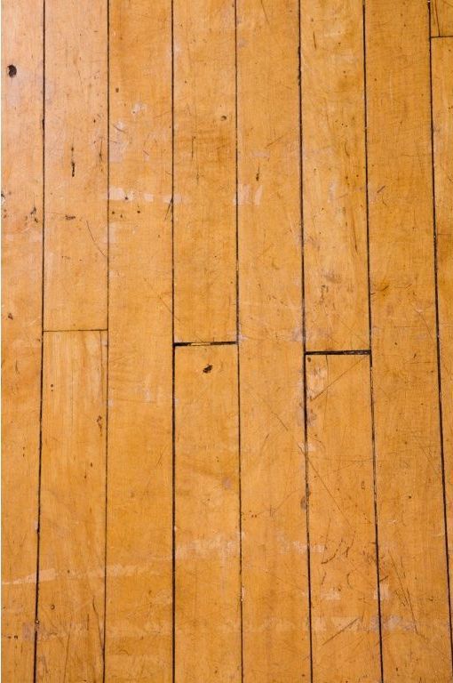 damaged hardwood floors that need to be sanded and refinished