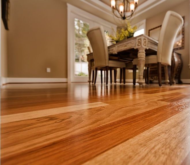 Close-up of recently refinished hardwood floors in a dining room in home in Virginia Beach, VA