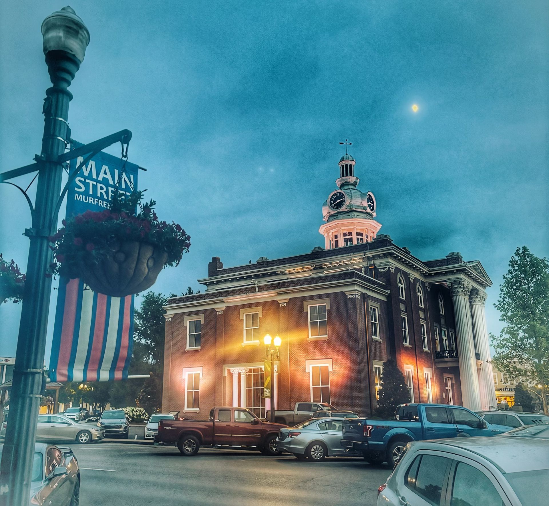 A large building with a sign that says main street