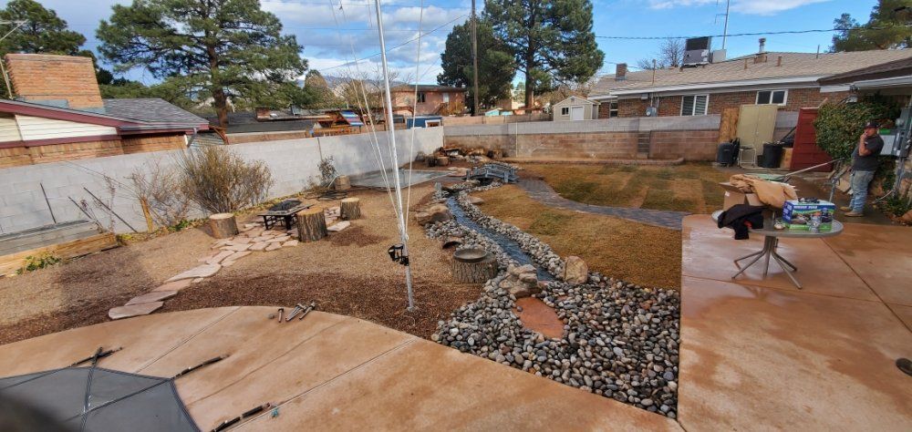 A collage of photos of a backyard with a stream running through it.
