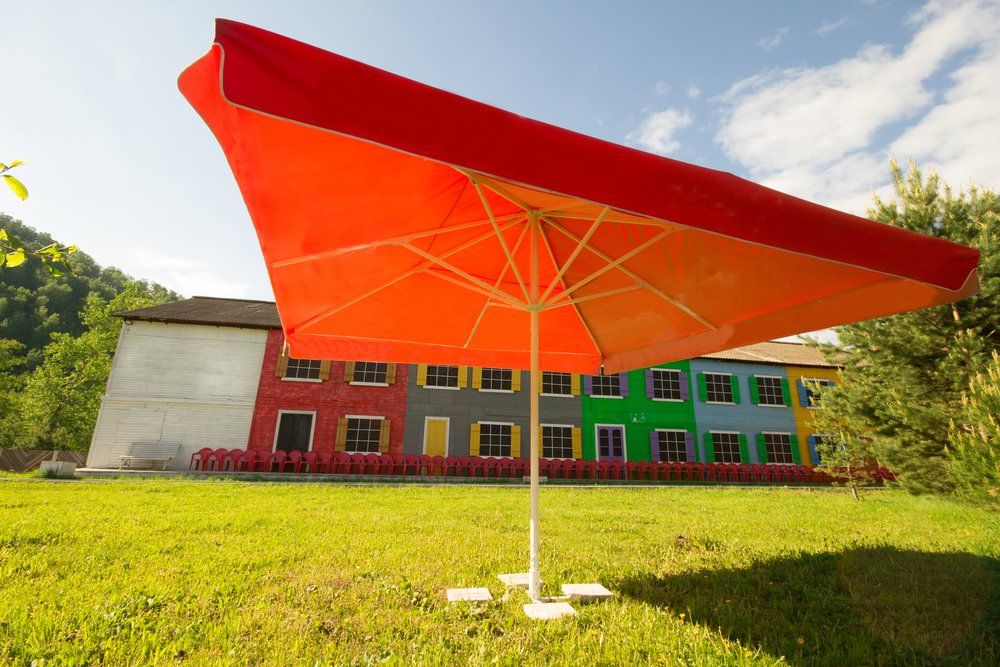 Umbrella at Open Space Garden — Commercial Garden Maintenance in Darling Downs Region, QLD