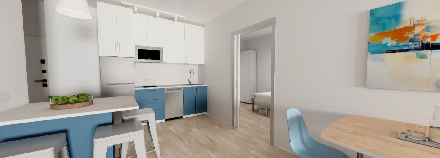 A kitchen with a table and chairs and a painting on the wall.