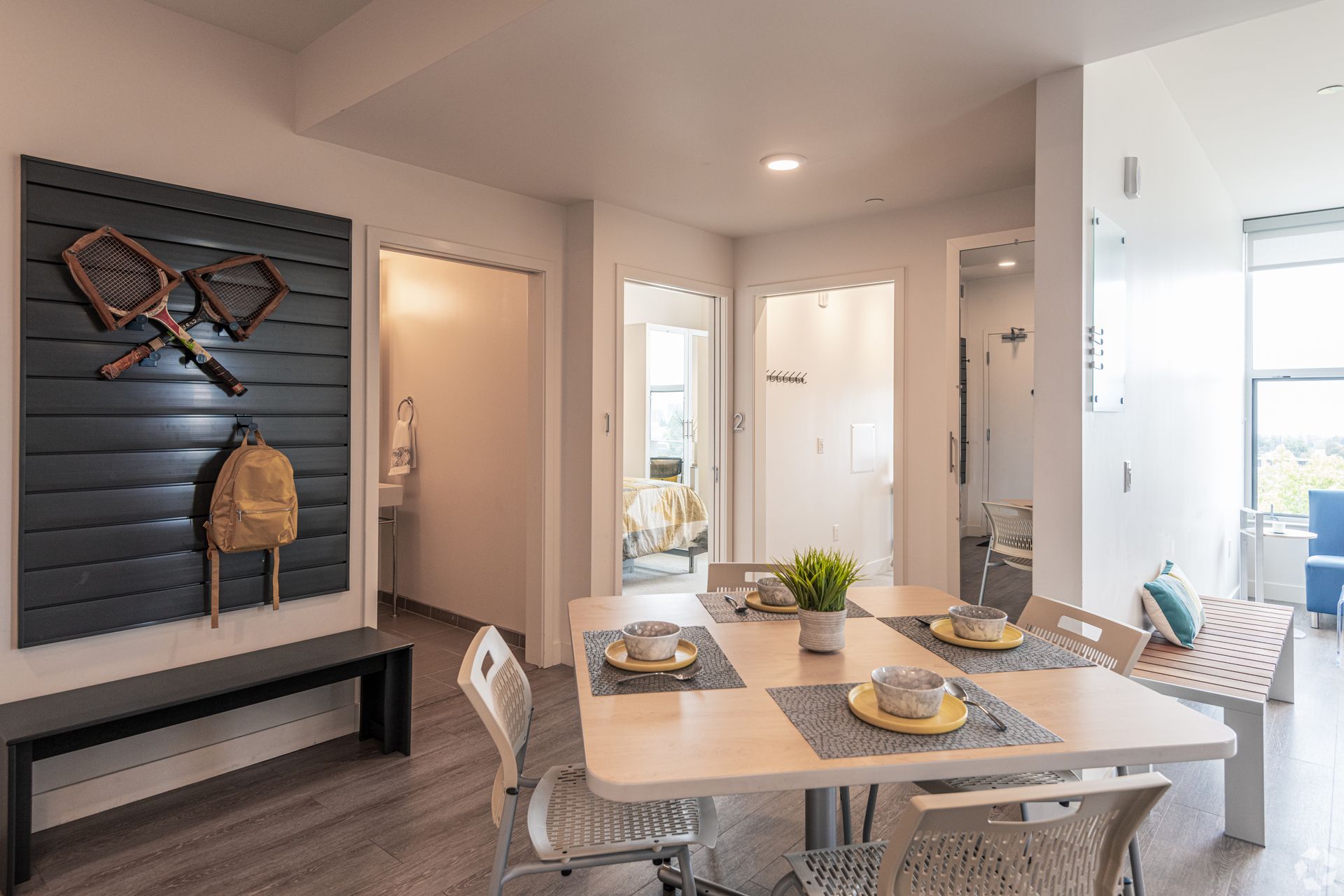 Panoramic Berkeley common area with dining table