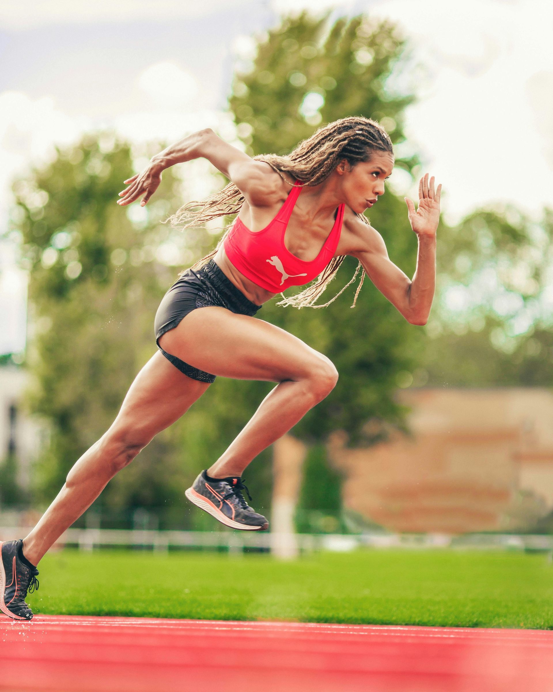 Woman performing hip stretch exercise to relieve hip pain
