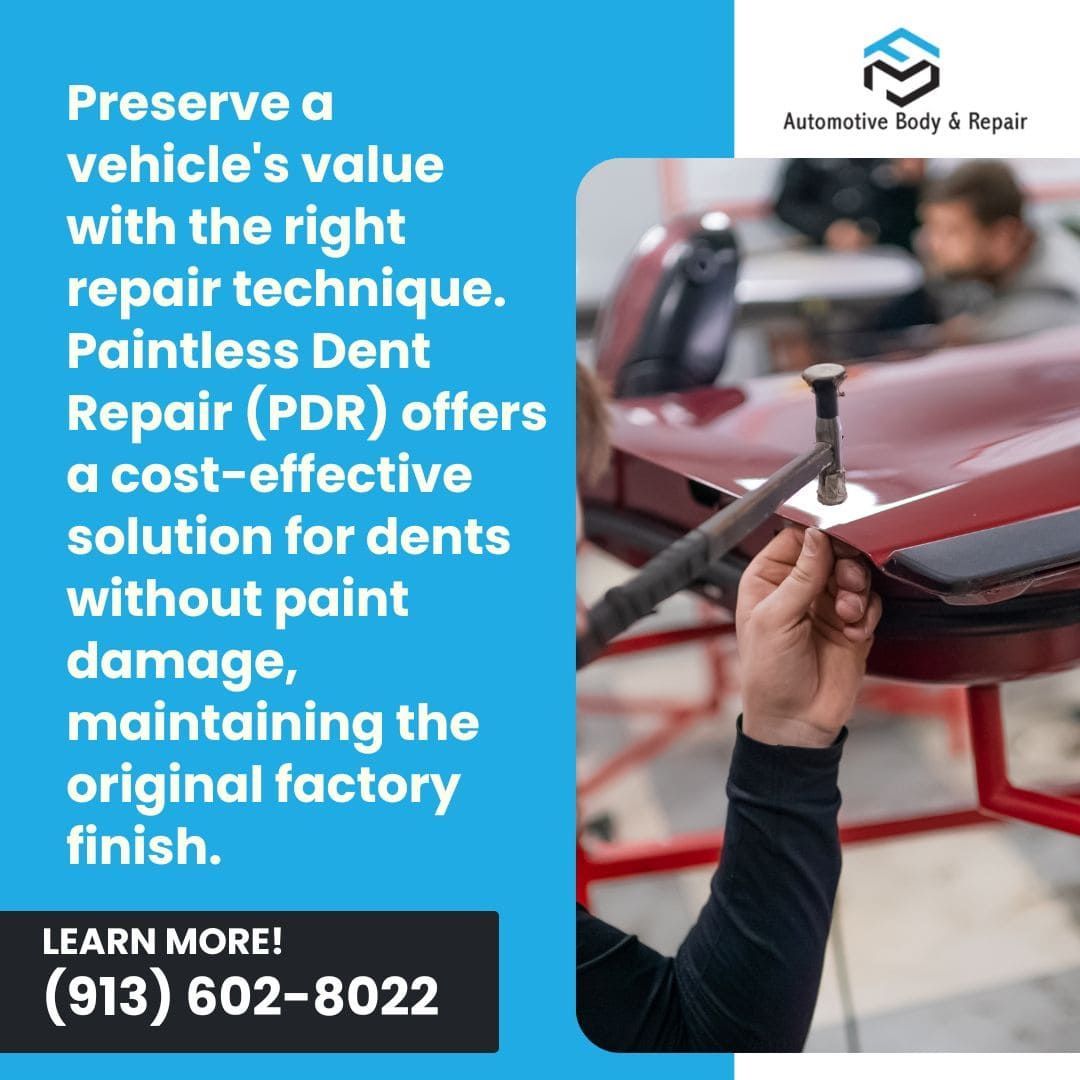 Technician performing paintless dent repair (PDR) on a red car's fender, showcasing a cost-effective solution that preserves the vehicle's original factory finish and value.