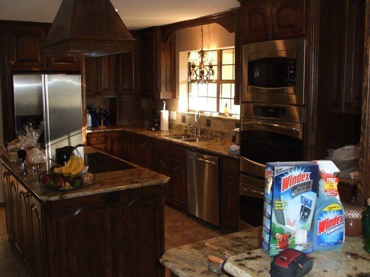 A kitchen with a box of max wipes on the counter