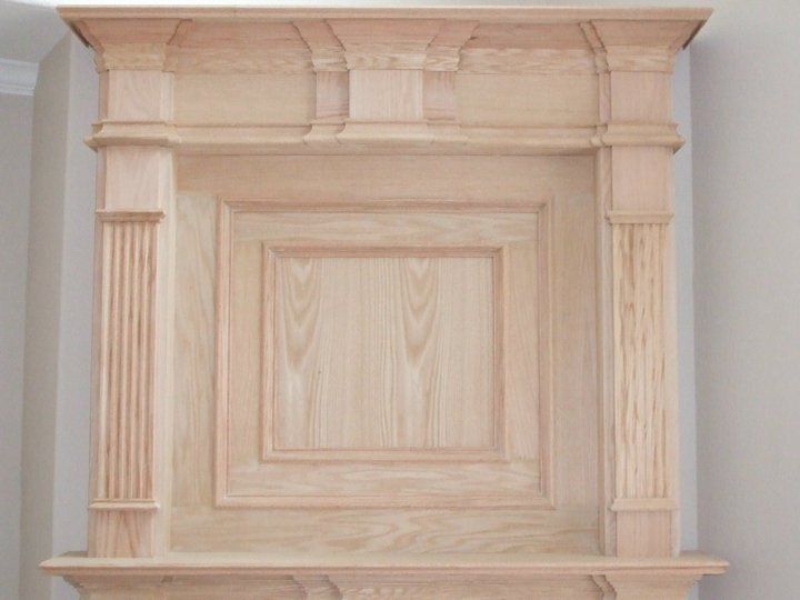 A wooden cabinet with a shelf underneath it