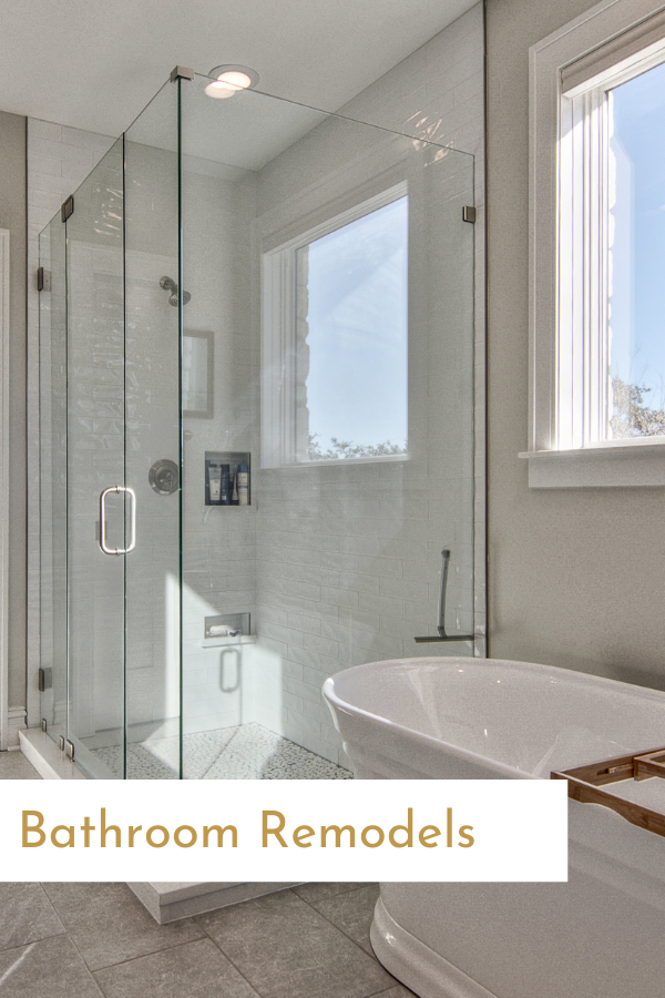 A bathroom with a tub , shower , and window.