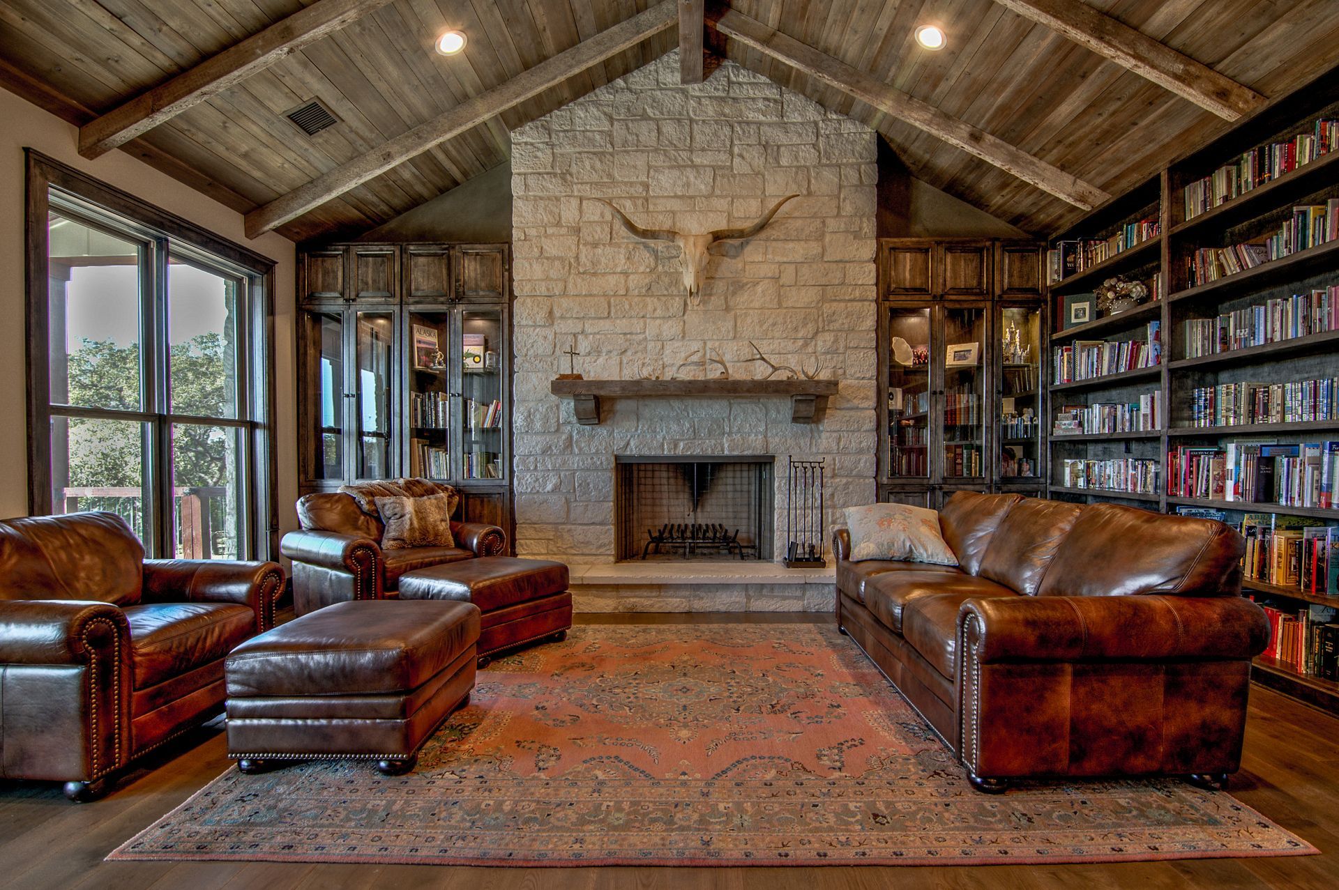 A living room filled with furniture and a fireplace.
