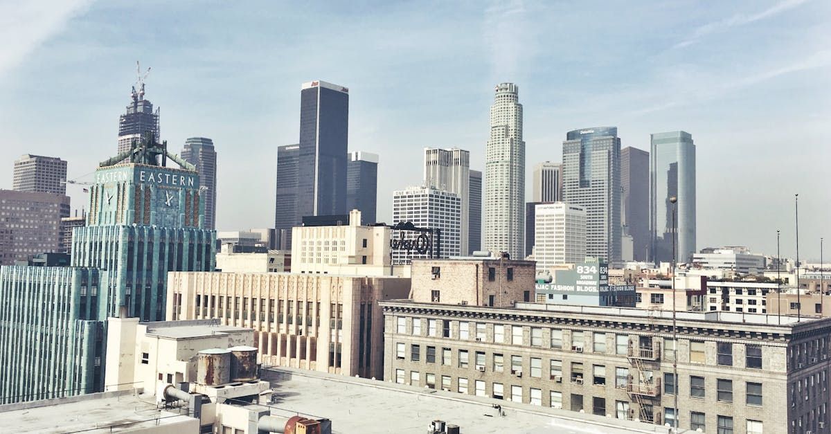An aerial view of a city skyline with a lot of tall buildings.