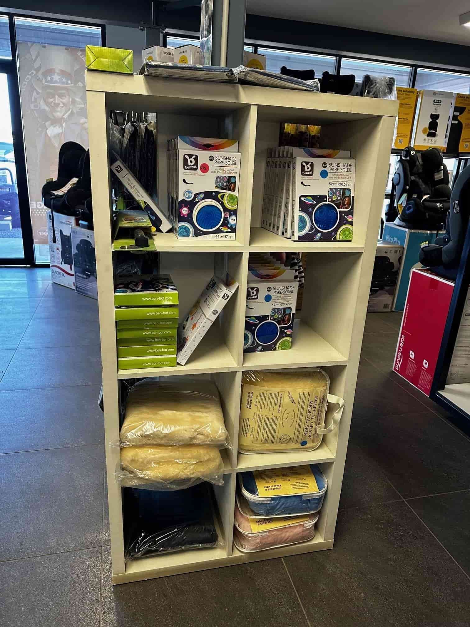 A White Shelf Filled With Lots Of Items In A Store — Smitty's Tyres & More In Taminda, NSW