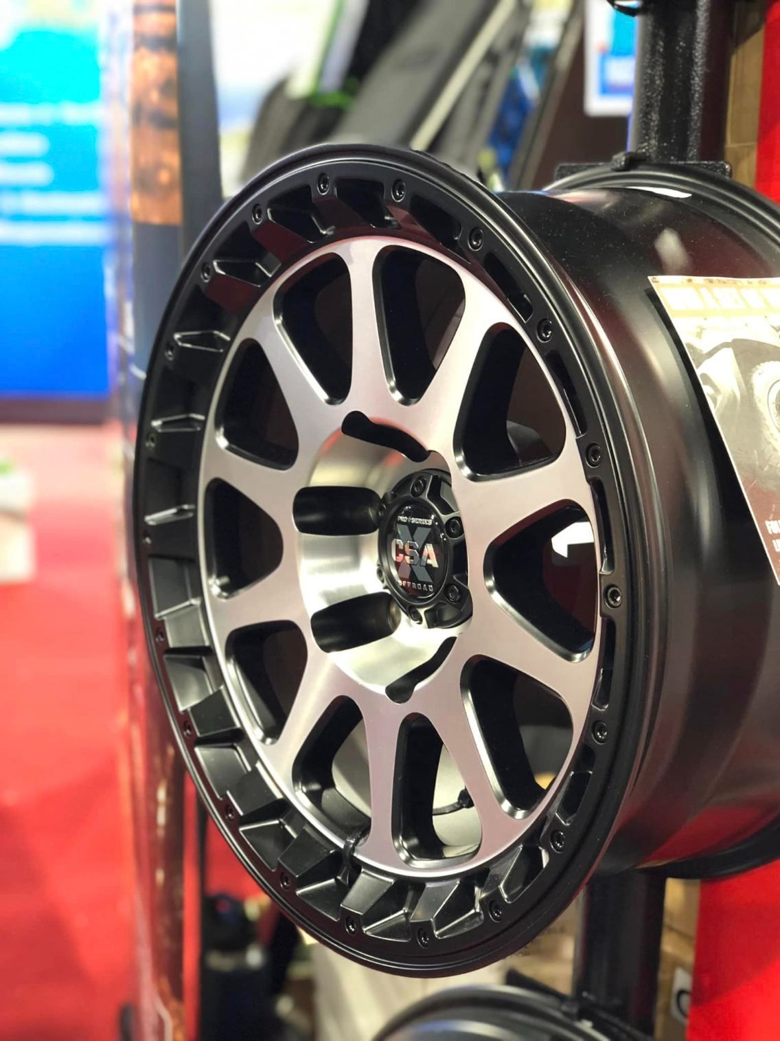 A Close Up Of A Black And Silver Wheel On Display — Smitty's Tyres & More In Taminda, NSW