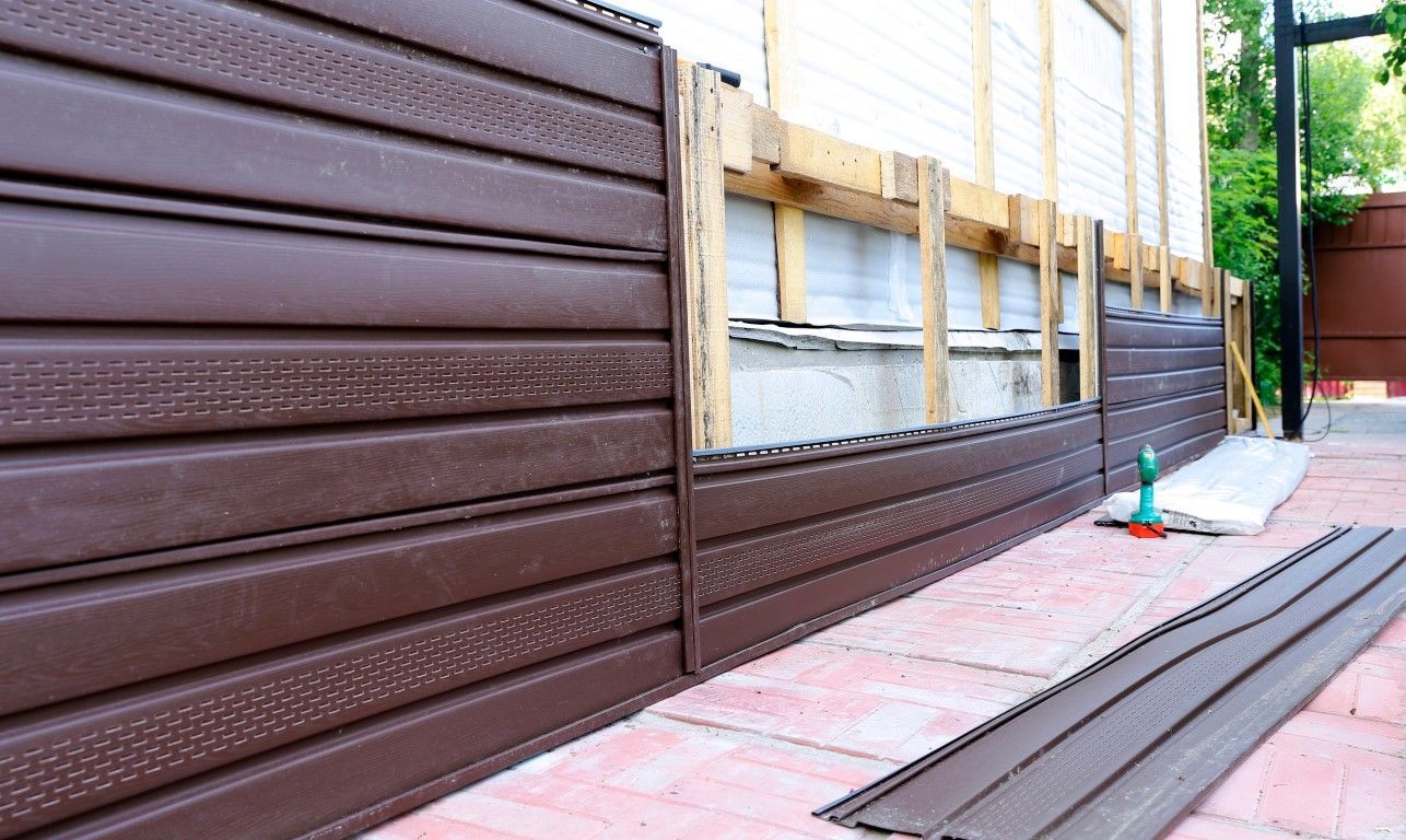 image of siding material being installed