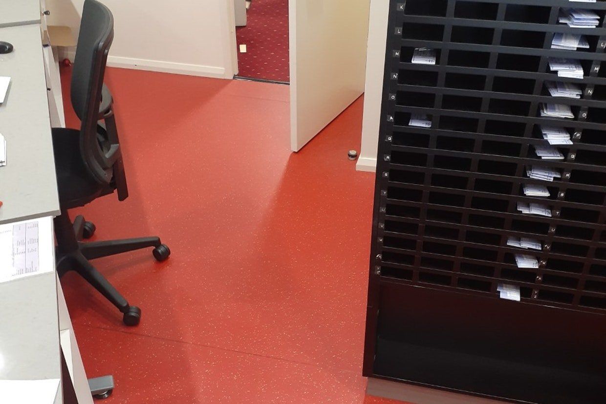 Orange Flooring of a Office — Ozwide Flooring in Ciccone, NT