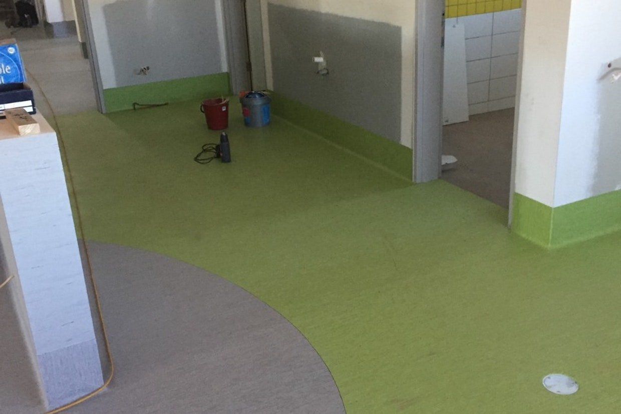 Gray and Green Flooring — Ozwide Flooring in Ciccone, NT
