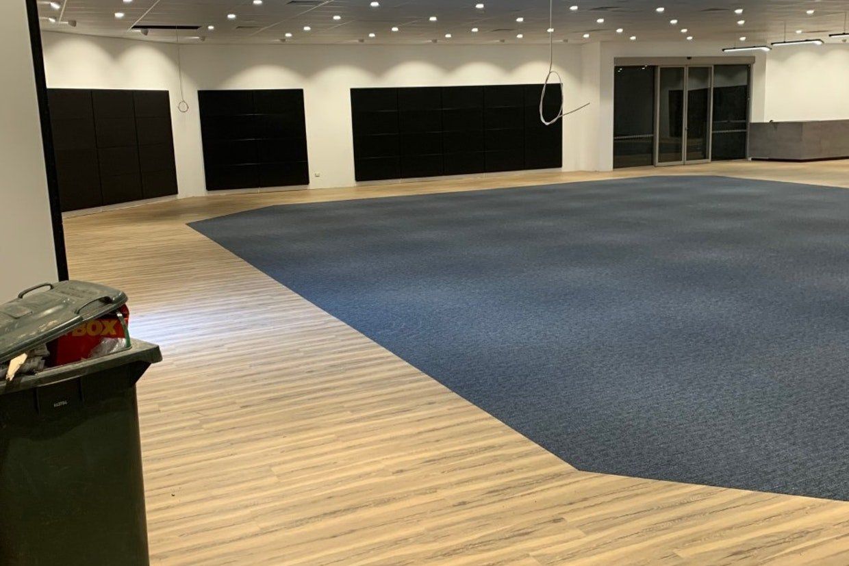 Empty Activity Hall — Ozwide Flooring in Ciccone, NT
