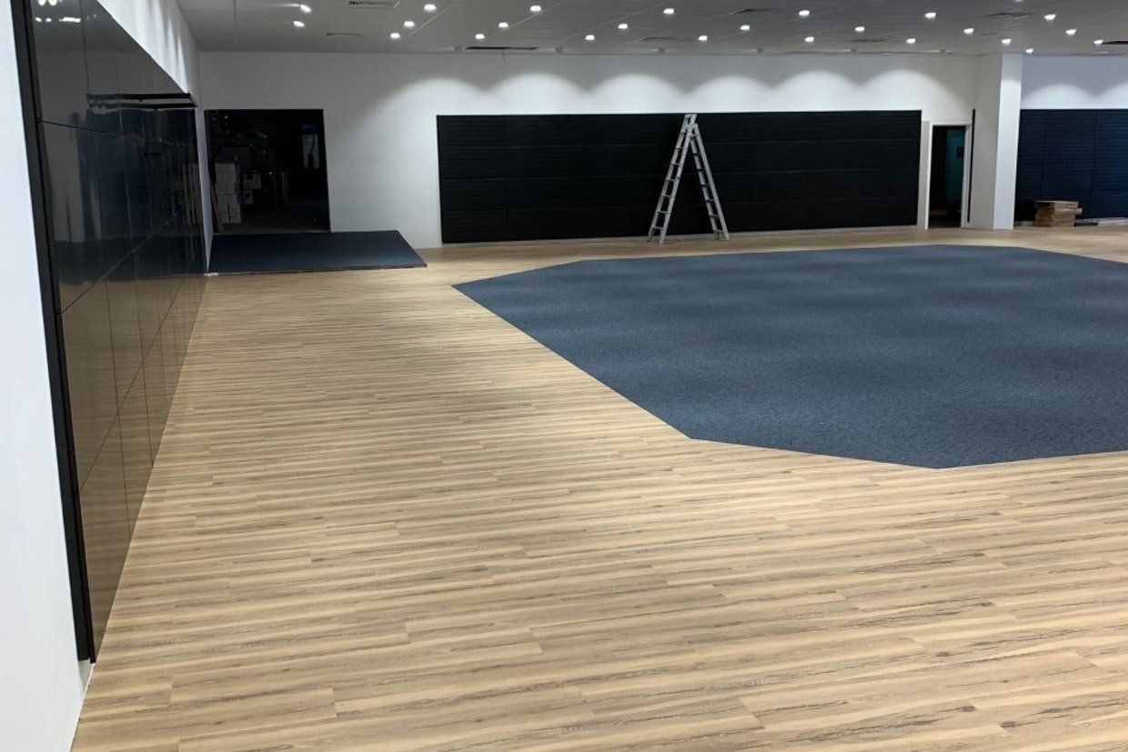 Black Carpet at the Center — Ozwide Flooring in Ciccone, NT