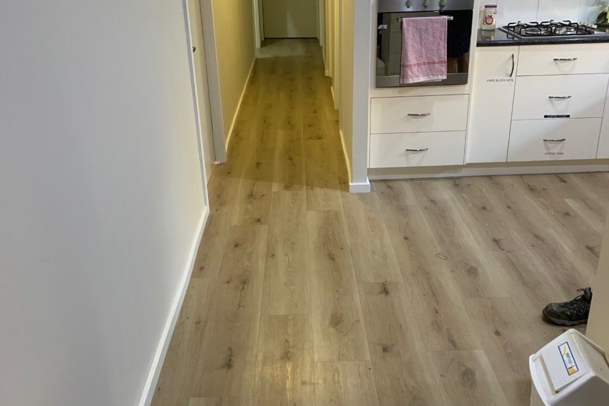 Light Brown Wooden Flooring on Path Way — Ozwide Flooring in Ciccone, NT