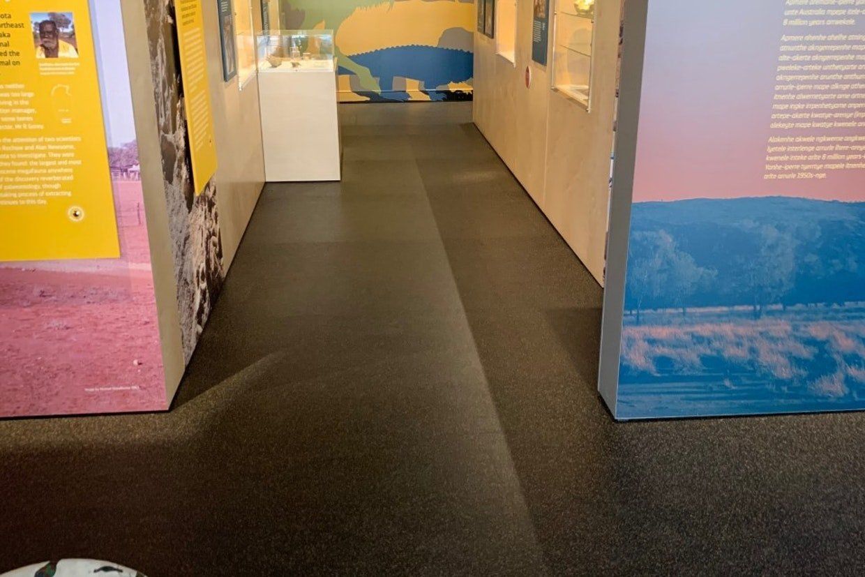 Black Tiled Flooring — Ozwide Flooring in Ciccone, NT