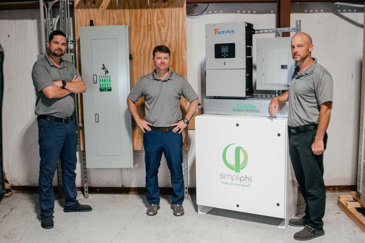 The GenSpring Power, Inc. Team Surrounding a Newly Installed Generator to a GA Home.