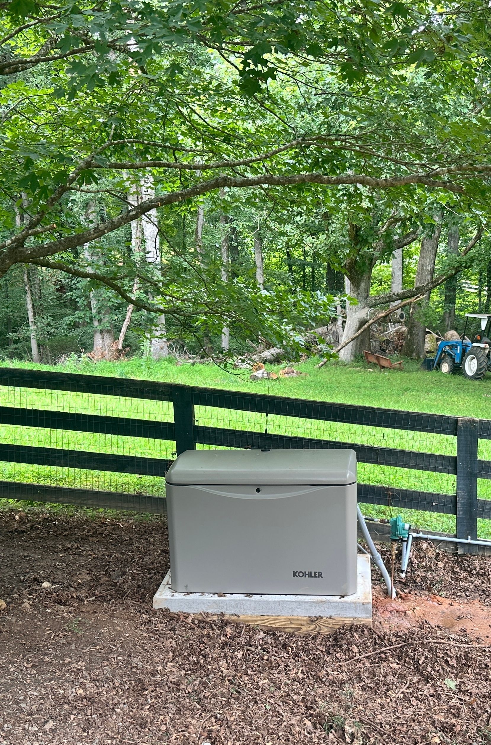 A Kohler 20KW Sit In the Yard of a North Georgia Barn Where It Was Installed by Genspring Power.