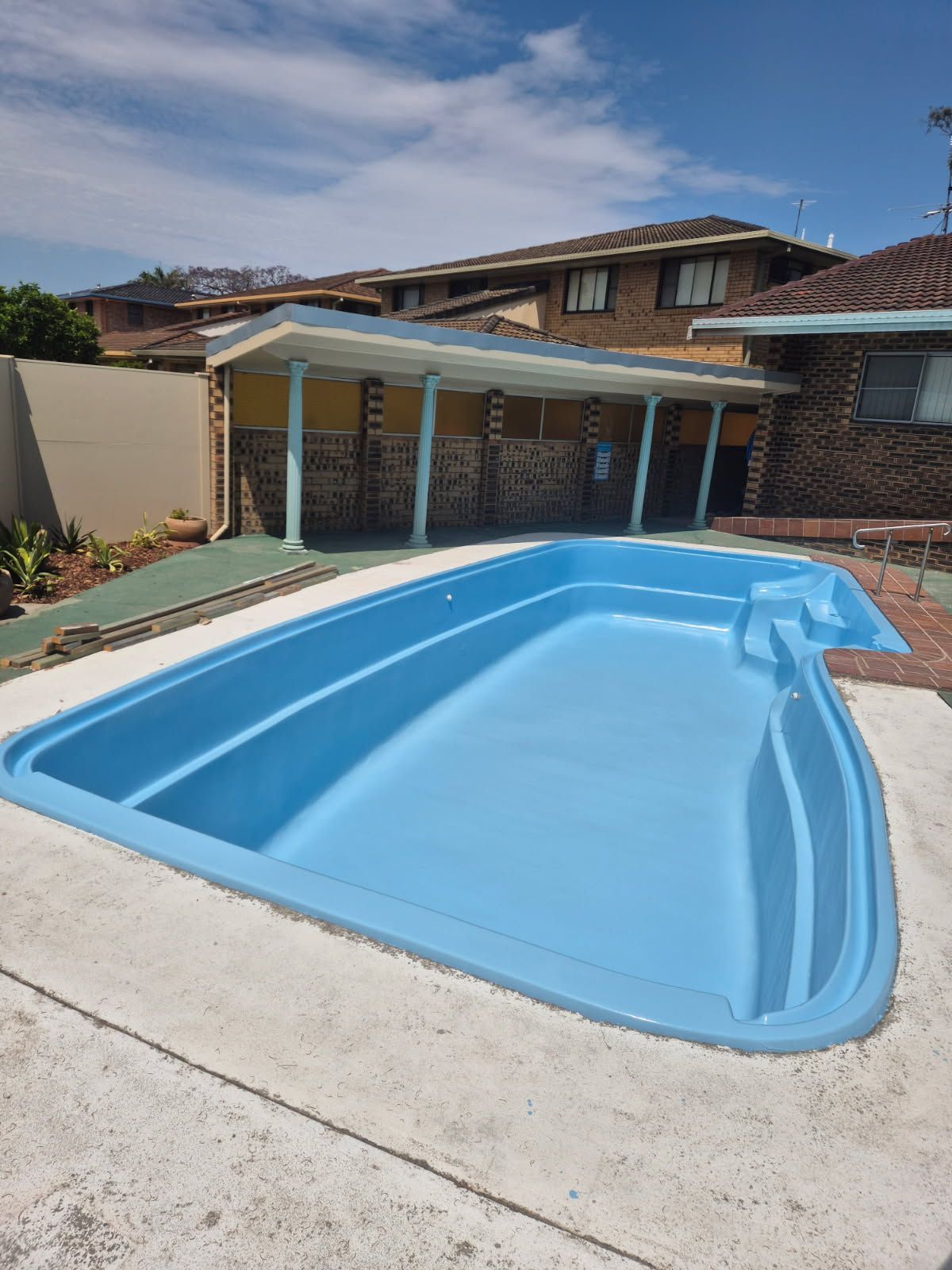 Finished pool with two coats of fluoro polymer paint