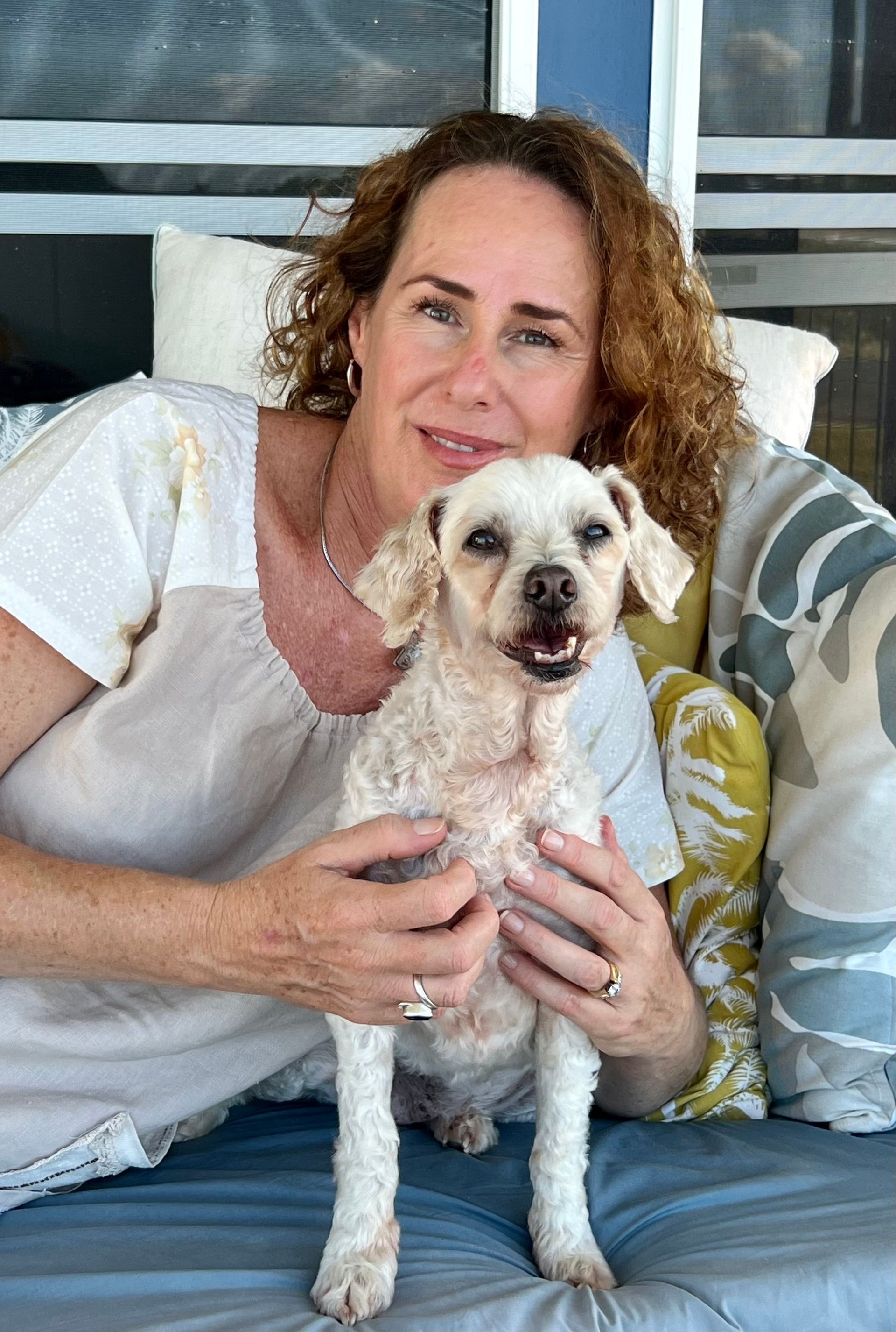 A Woman Undergoing Healing Therapy Session — Mind Body Soul Healing in Cooee Bay, QLD